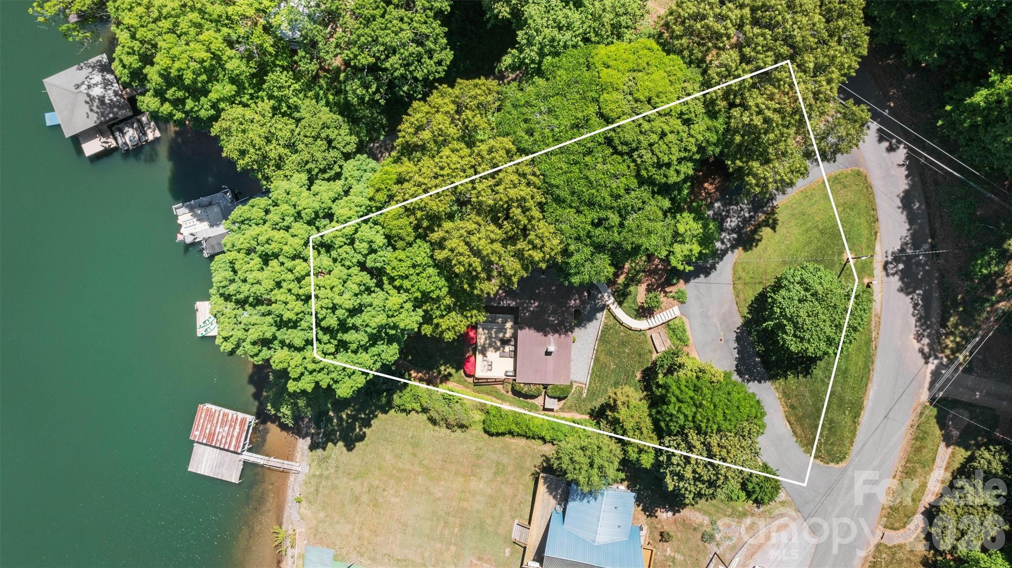 6566 Harbor Lane Conover, NC 28613 - Photo 41 of 43 an aerial view of a house with a yard and garden