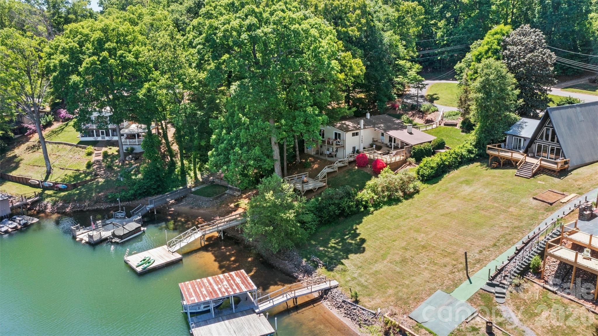 6566 Harbor Lane Conover, NC 28613 - Photo 42 of 43 an aerial view of a house with a yard basket ball court and outdoor seating