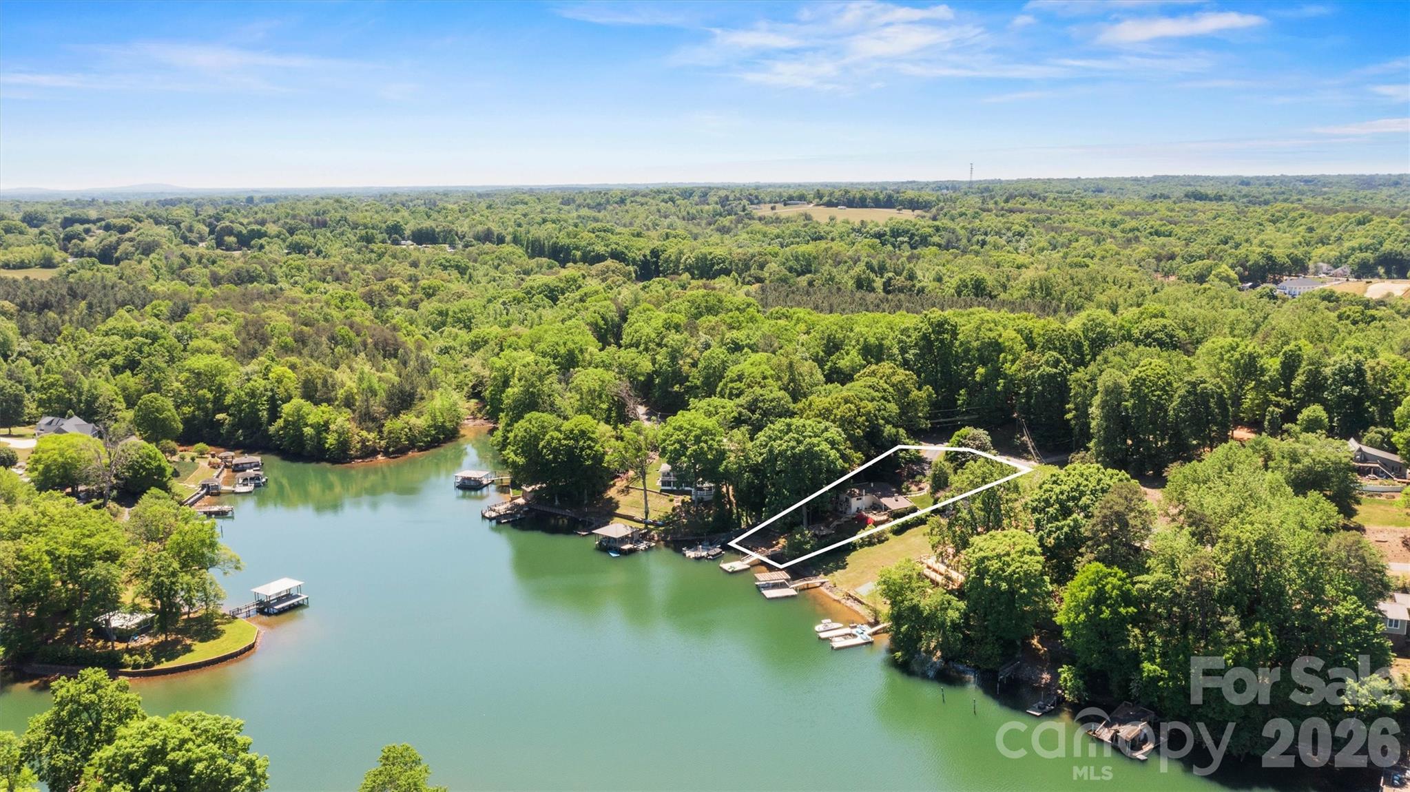 6566 Harbor Lane Conover, NC 28613 - Photo 43 of 43 a view of a lake with a city