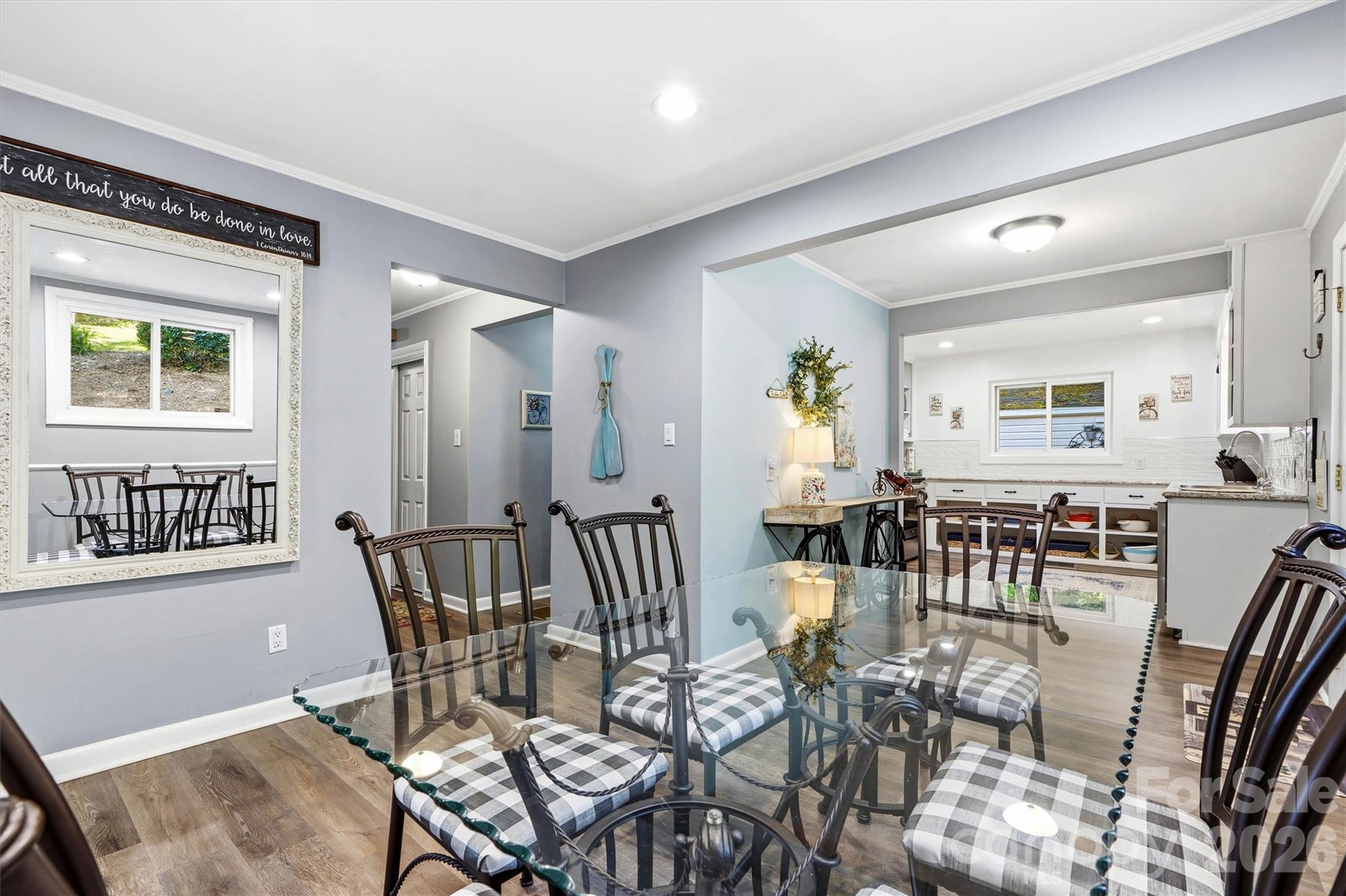 6566 Harbor Lane Conover, NC 28613 - Photo 10 of 43 a view of a dining room with furniture and wooden floor