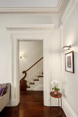 a view of entryway and livingroom with wooden floor