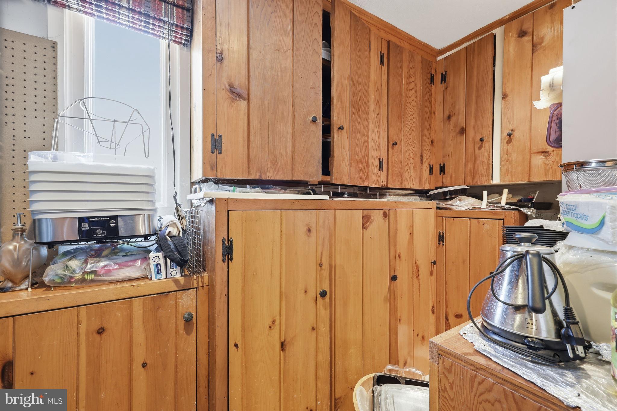 24 Old Limekiln Road Doylestown, PA 18901 - Photo 15 of 33 a view of a door and chair in the kitchen