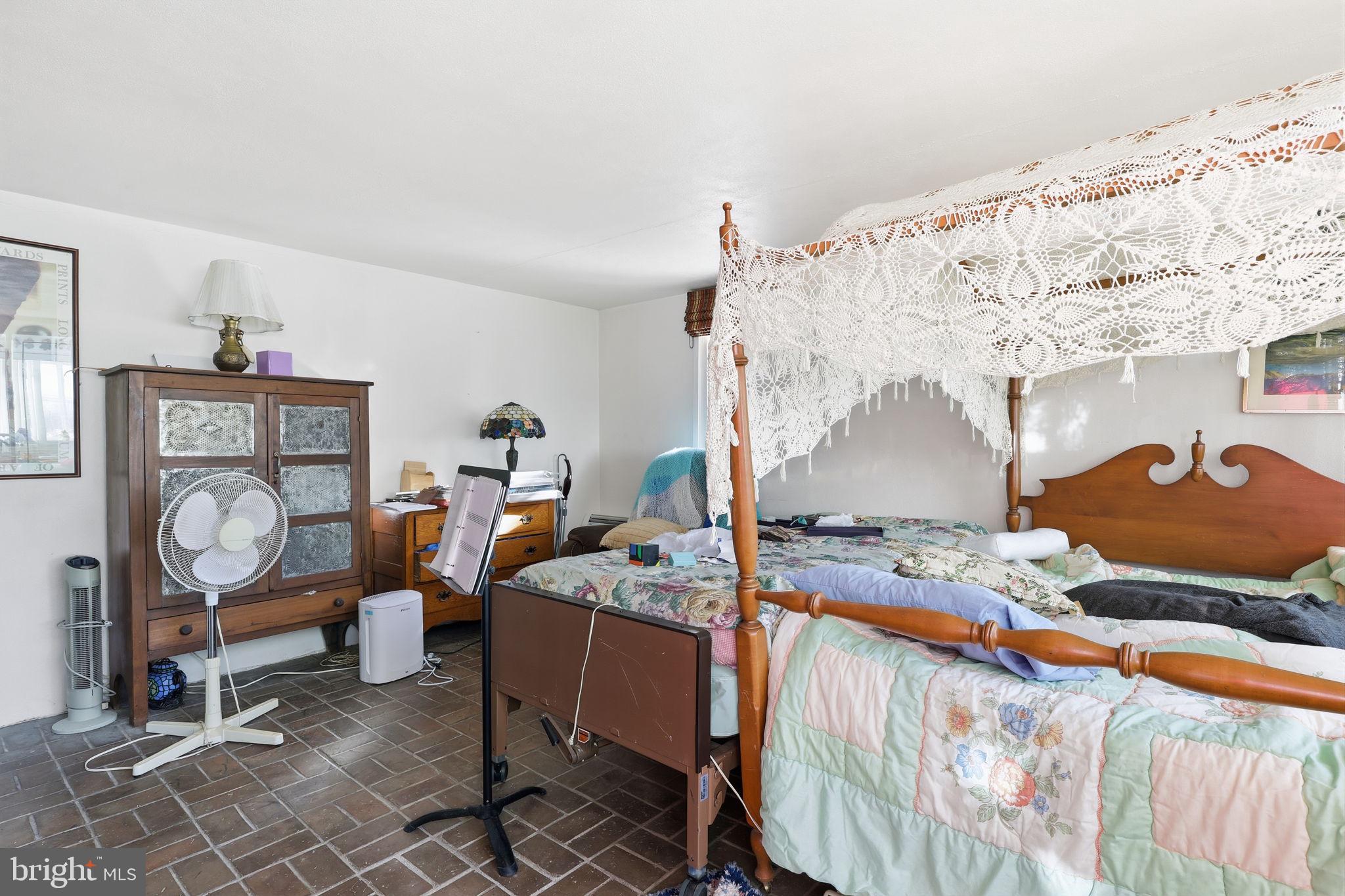 24 Old Limekiln Road Doylestown, PA 18901 - Photo 16 of 33 a living room with furniture a rug and a fireplace
