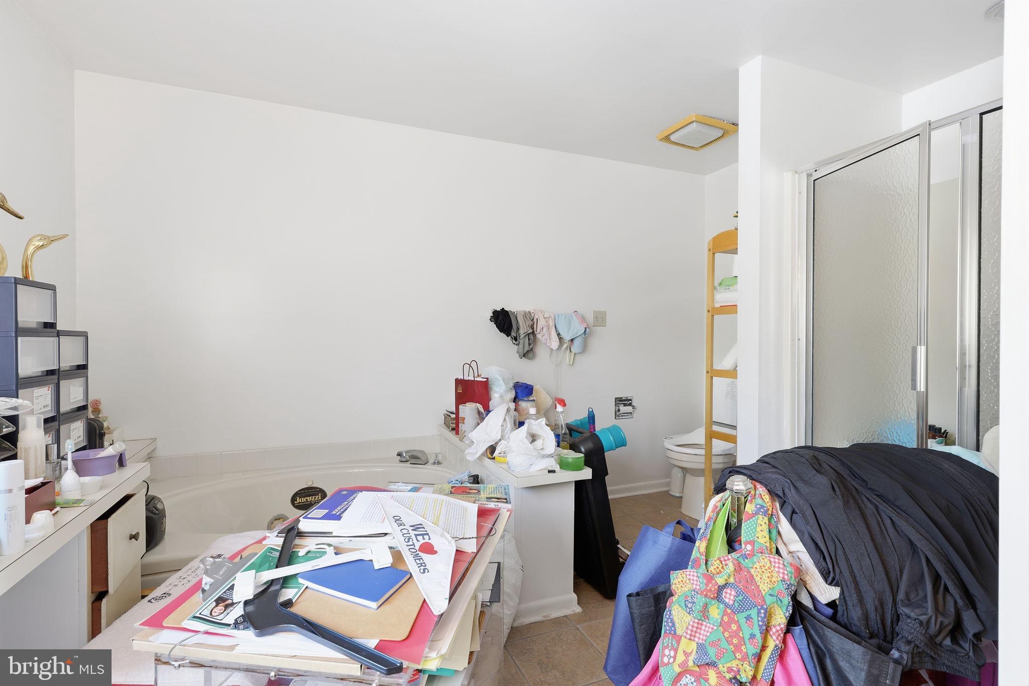 24 Old Limekiln Road Doylestown, PA 18901 - Photo 22 of 33 a bedroom with a bed and a couch