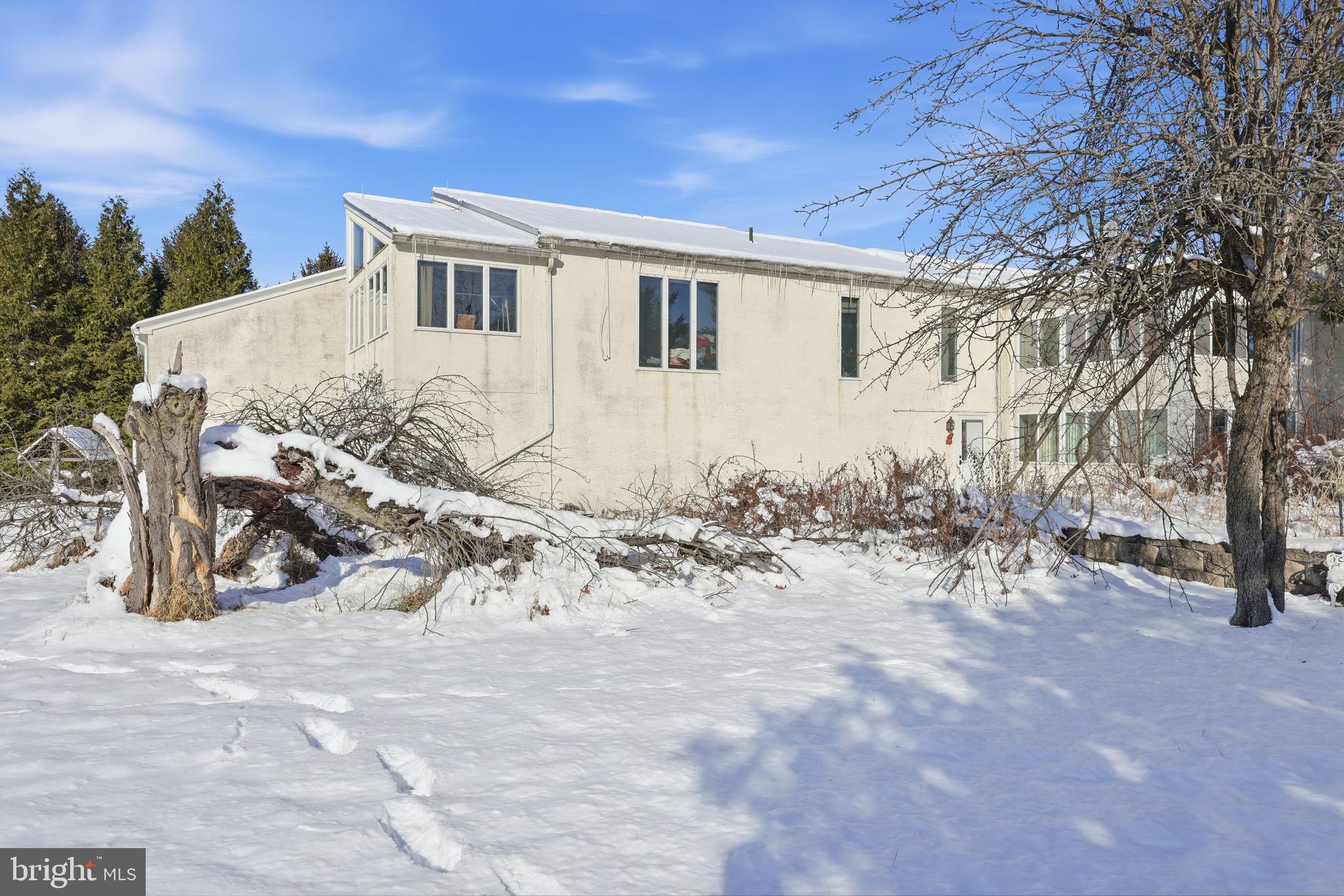 24 Old Limekiln Road Doylestown, PA 18901 - Photo 3 of 33 a view of a house with snow on the road