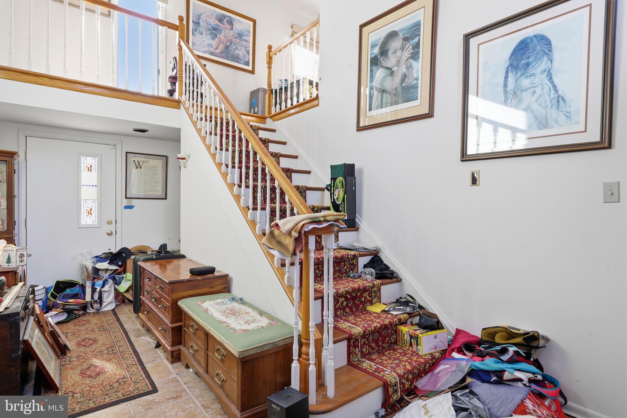 24 Old Limekiln Road Doylestown, PA 18901 - Photo 8 of 33 a view of a hallway with furniture and stairs