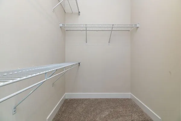 a view of a room with racks on the wall