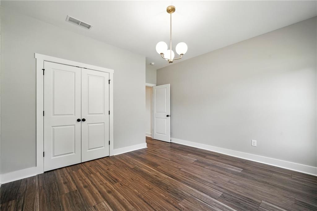 125 Old Alabama Road Southeast Emerson, GA 30137 - Photo 17 of 37 a view of an empty room with wooden floor