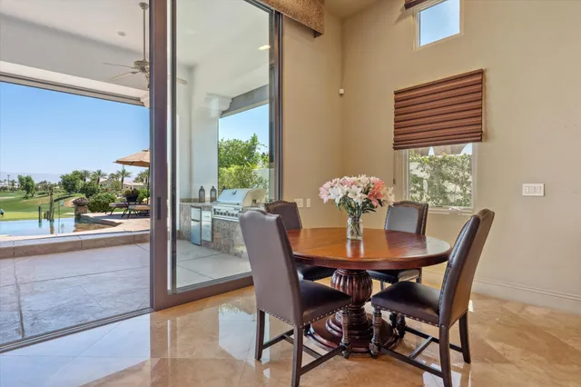 a spacious bathroom with a double vanity sink and a mirror