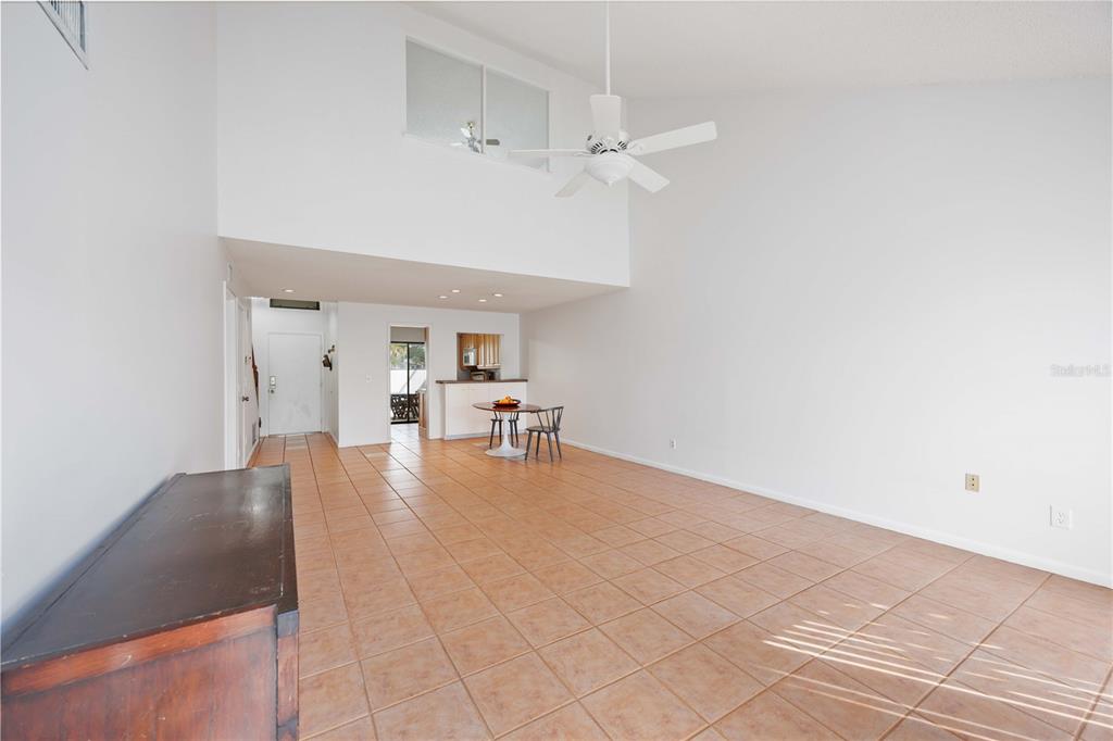 2767 Horseshoe Court, Unit Q3 Sarasota, FL 34235 - Photo 14 of 49 a view of livingroom with furniture and workspace