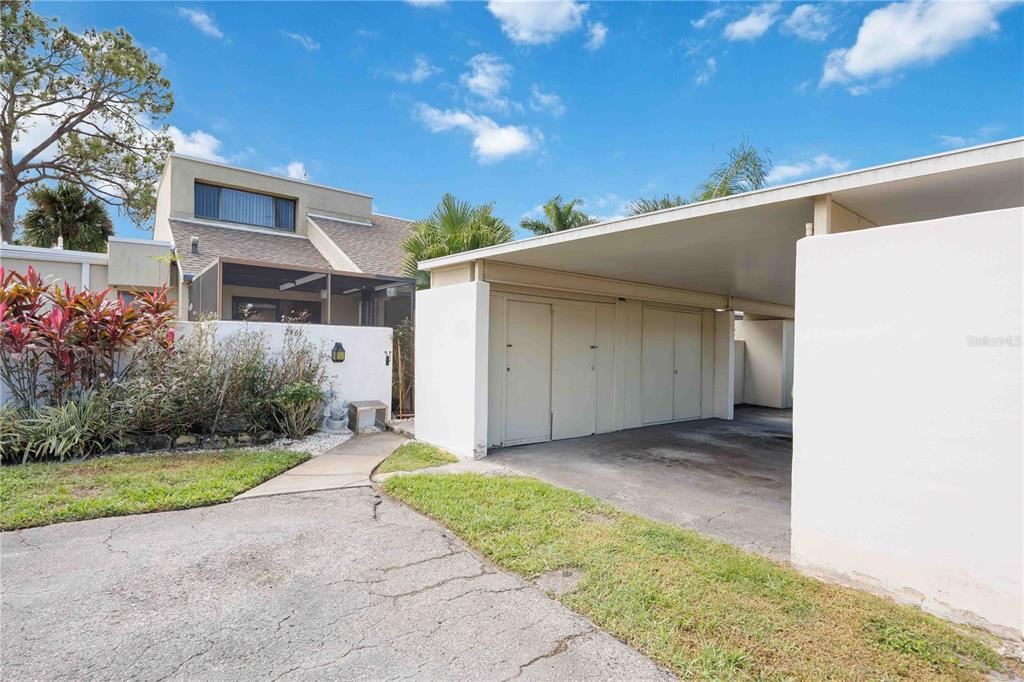 2767 Horseshoe Court, Unit Q3 Sarasota, FL 34235 - Photo 3 of 49 a view of a house with a yard