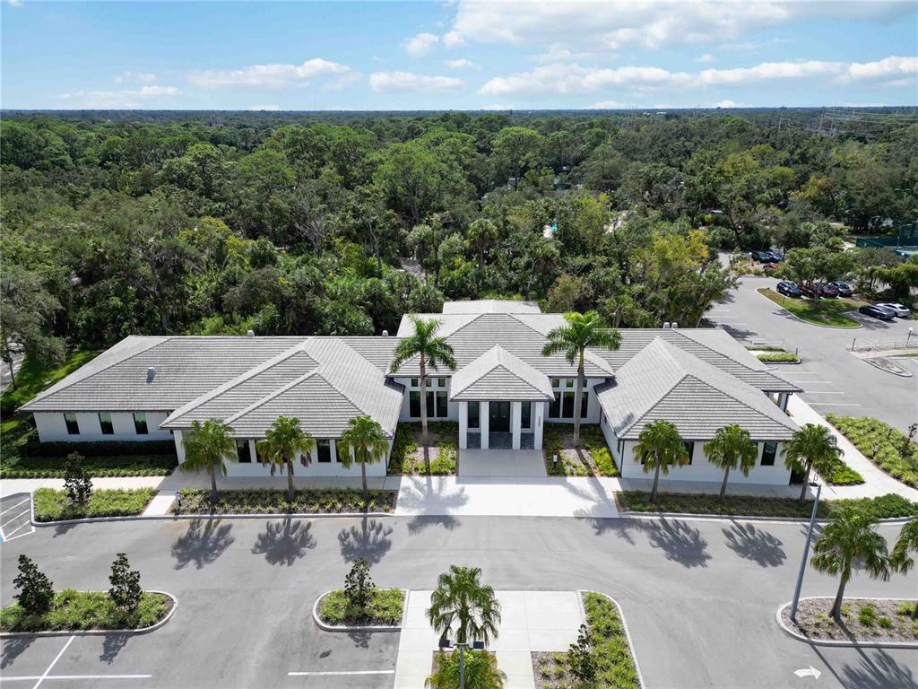 2767 Horseshoe Court, Unit Q3 Sarasota, FL 34235 - Photo 39 of 49 an aerial view of a house with swimming pool and outdoor seating