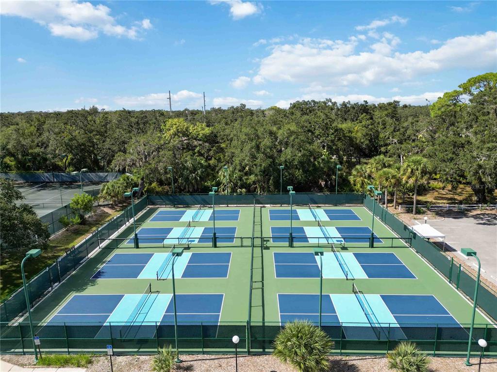 2767 Horseshoe Court, Unit Q3 Sarasota, FL 34235 - Photo 41 of 49 a view of an outdoor space pool patio and outdoor seating