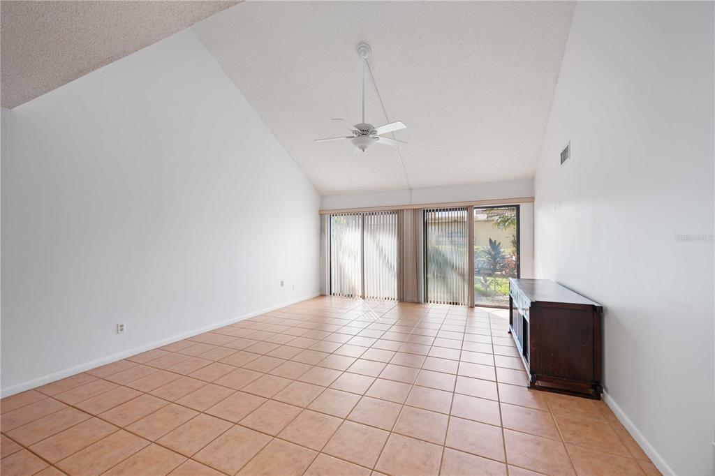 2767 Horseshoe Court, Unit Q3 Sarasota, FL 34235 - Photo 10 of 49 a view of an empty room with a window