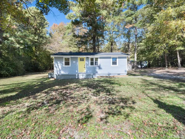 front view of house with a yard
