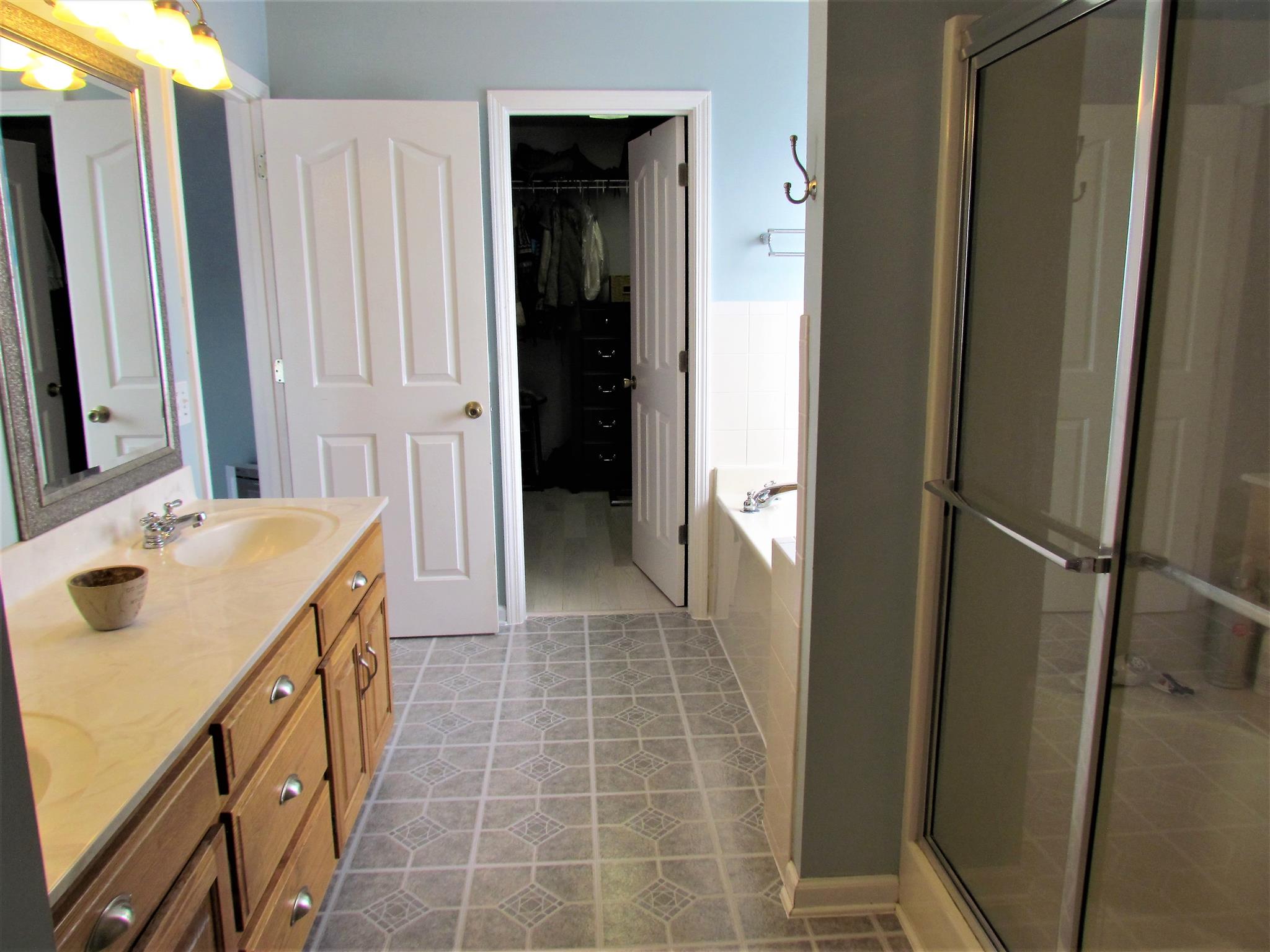 187 Coleman Road Readyville, TN 37149 - Photo 8 of 30 The master bathroom has a double vanity, garden tub and separate shower