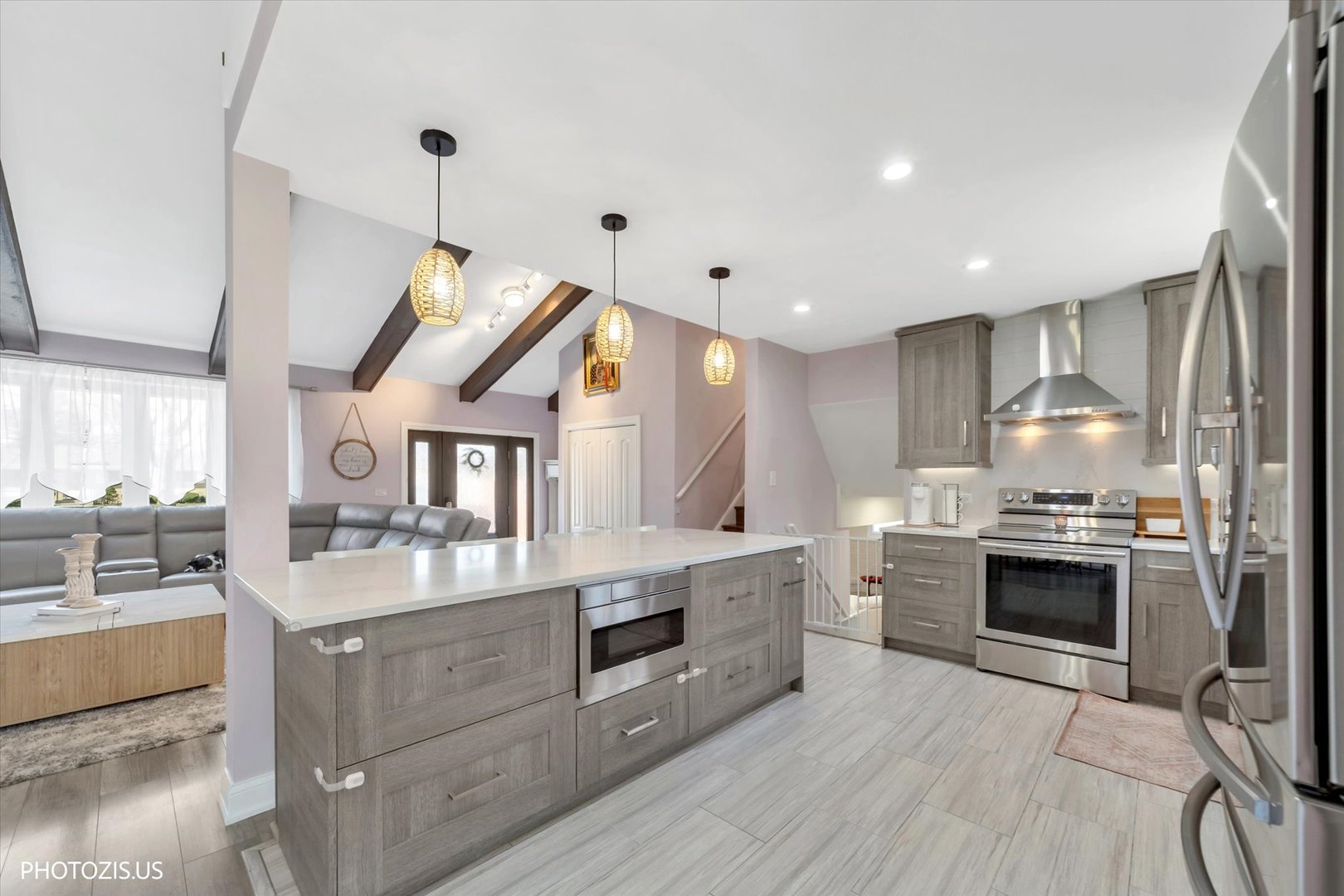 981 North Mill Road Addison, IL 60101 - Photo 11 of 41 a kitchen with stainless steel appliances granite countertop a stove and more cabinets