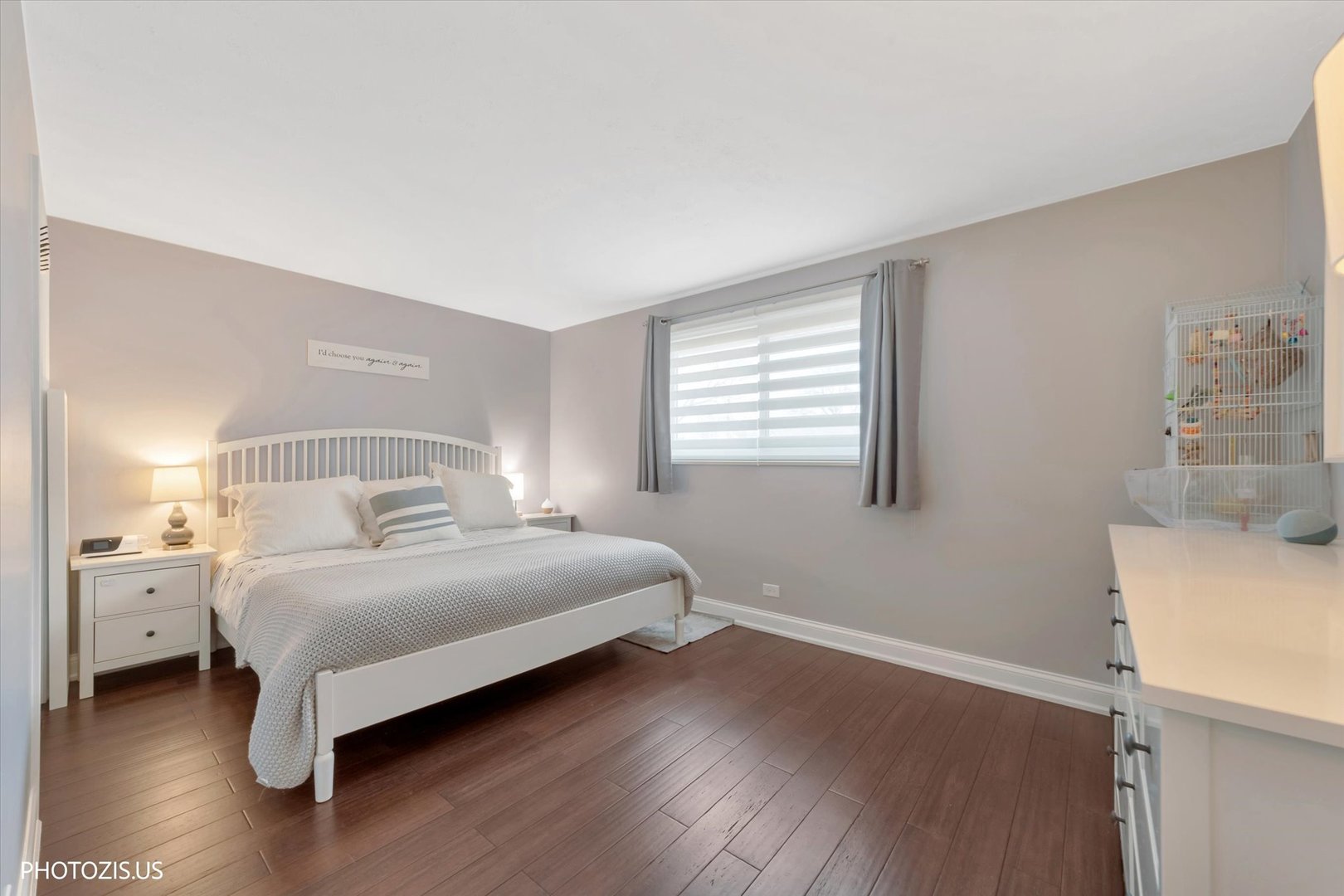 981 North Mill Road Addison, IL 60101 - Photo 20 of 41 a bedroom with a bed and a table