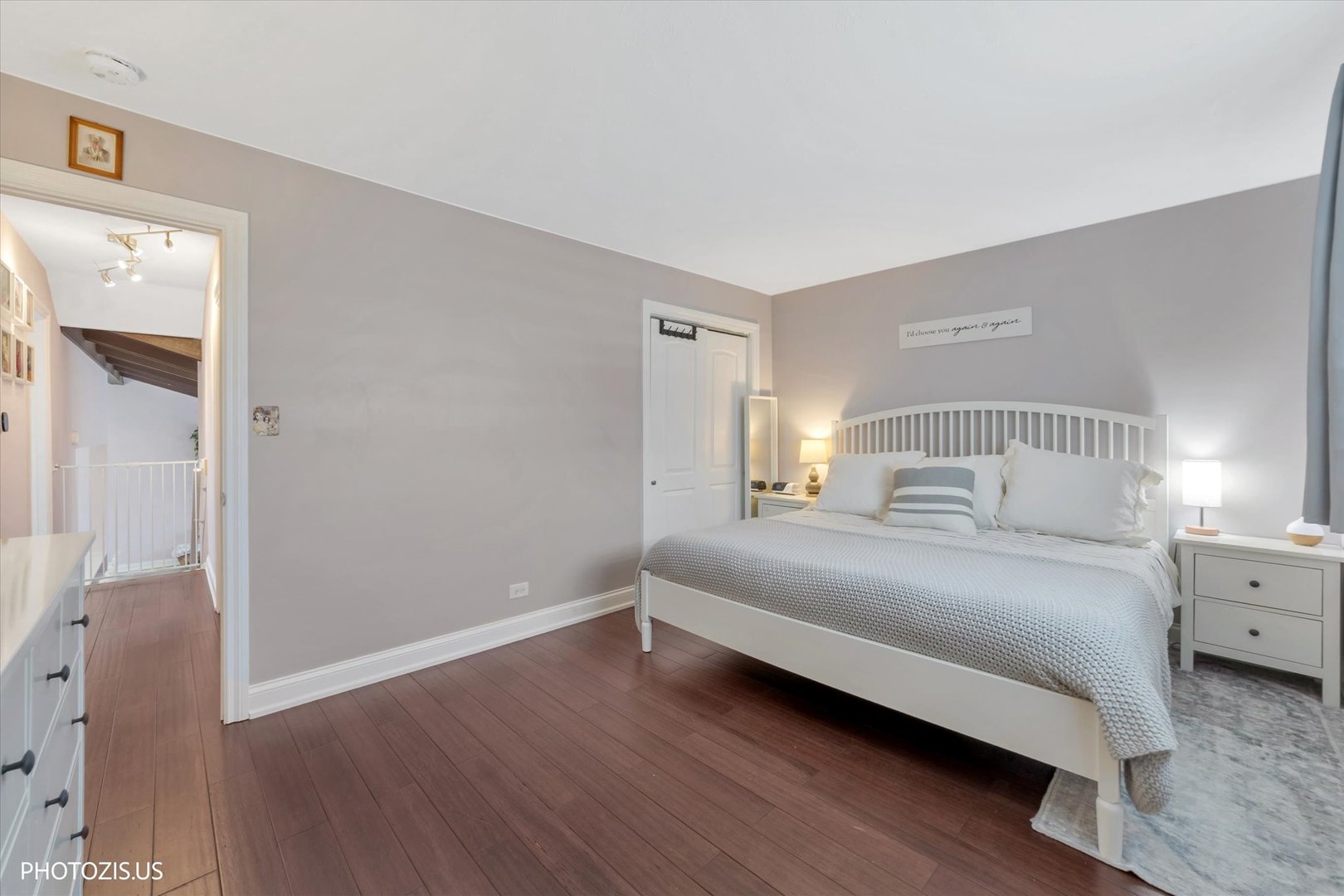 981 North Mill Road Addison, IL 60101 - Photo 21 of 41 a bedroom with a bed and wooden floor