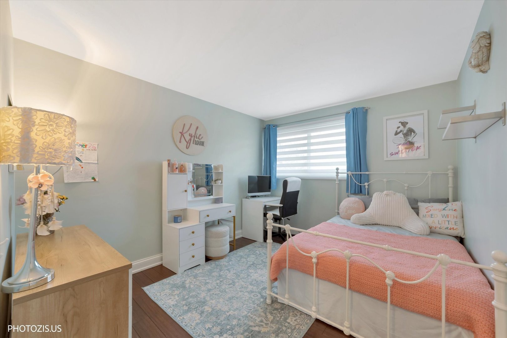 981 North Mill Road Addison, IL 60101 - Photo 25 of 41 a bedroom with a bed and a table in it