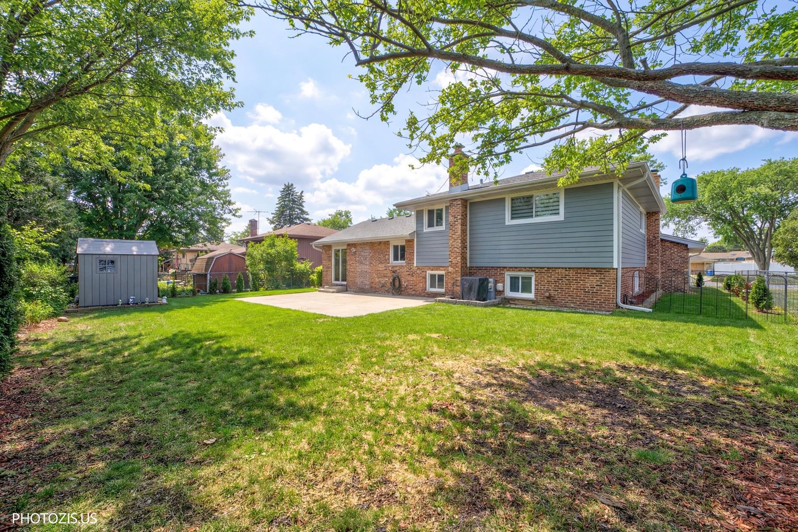 981 North Mill Road Addison, IL 60101 - Photo 37 of 41 a view of a house with a yard