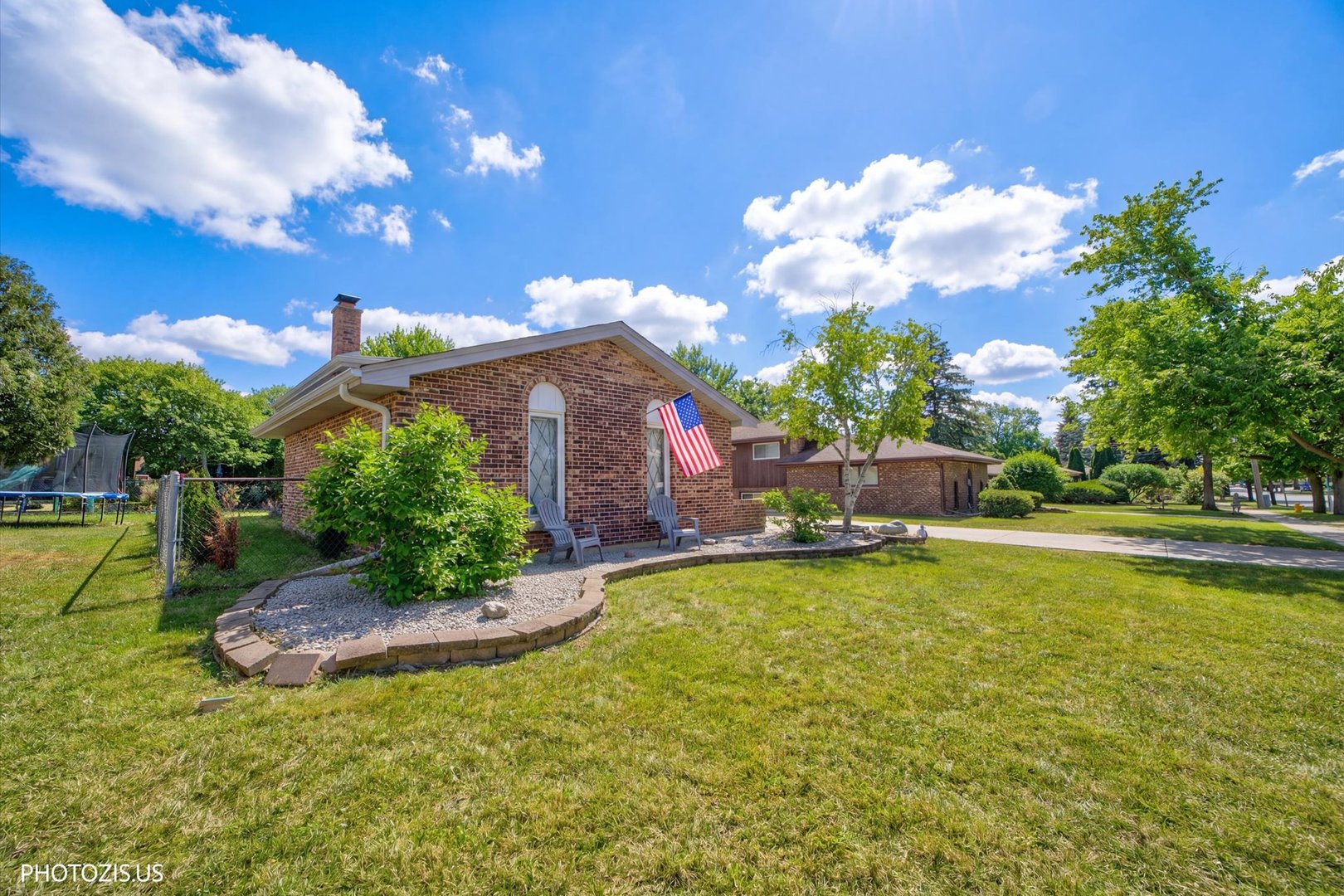 981 North Mill Road Addison, IL 60101 - Photo 39 of 41 a view of a swimming pool with a yard