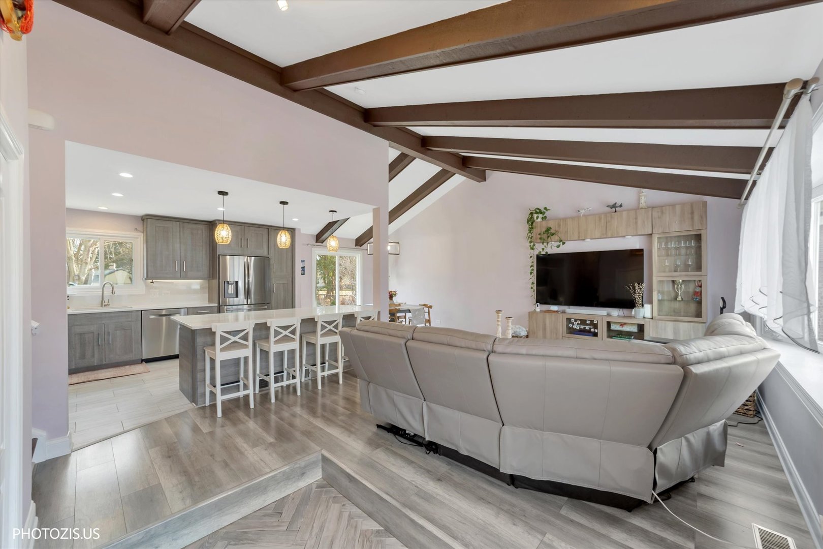 981 North Mill Road Addison, IL 60101 - Photo 4 of 41 a living room with furniture and a flat screen tv