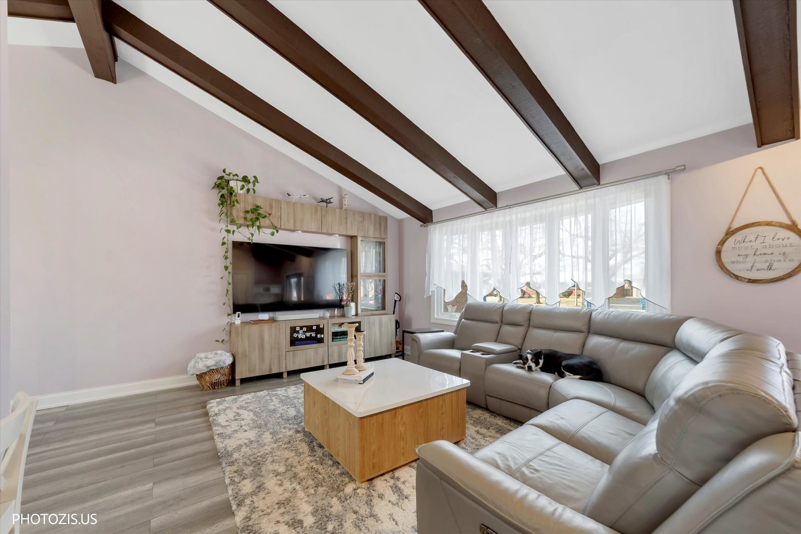 981 North Mill Road Addison, IL 60101 - Photo 6 of 41 a living room with furniture and a flat screen tv