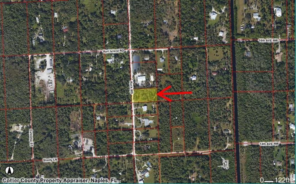 1500 Rock Road Naples, FL 34120 - Photo 2 of 9 a view of a house and a yard