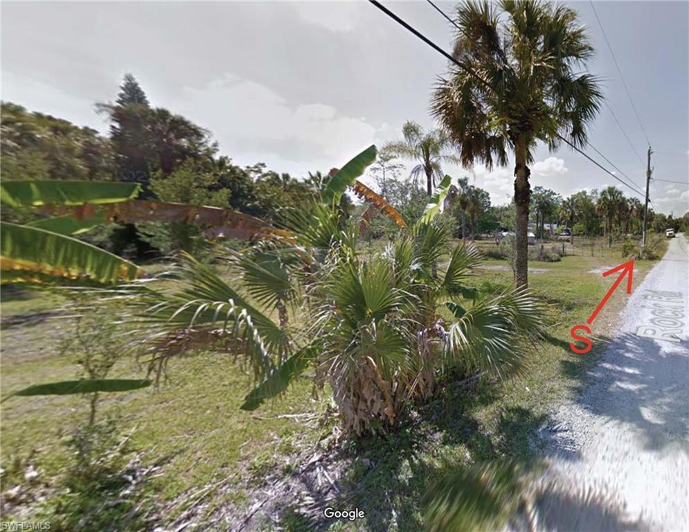 1500 Rock Road Naples, FL 34120 - Photo 4 of 9 a view of an outdoor space and a yard