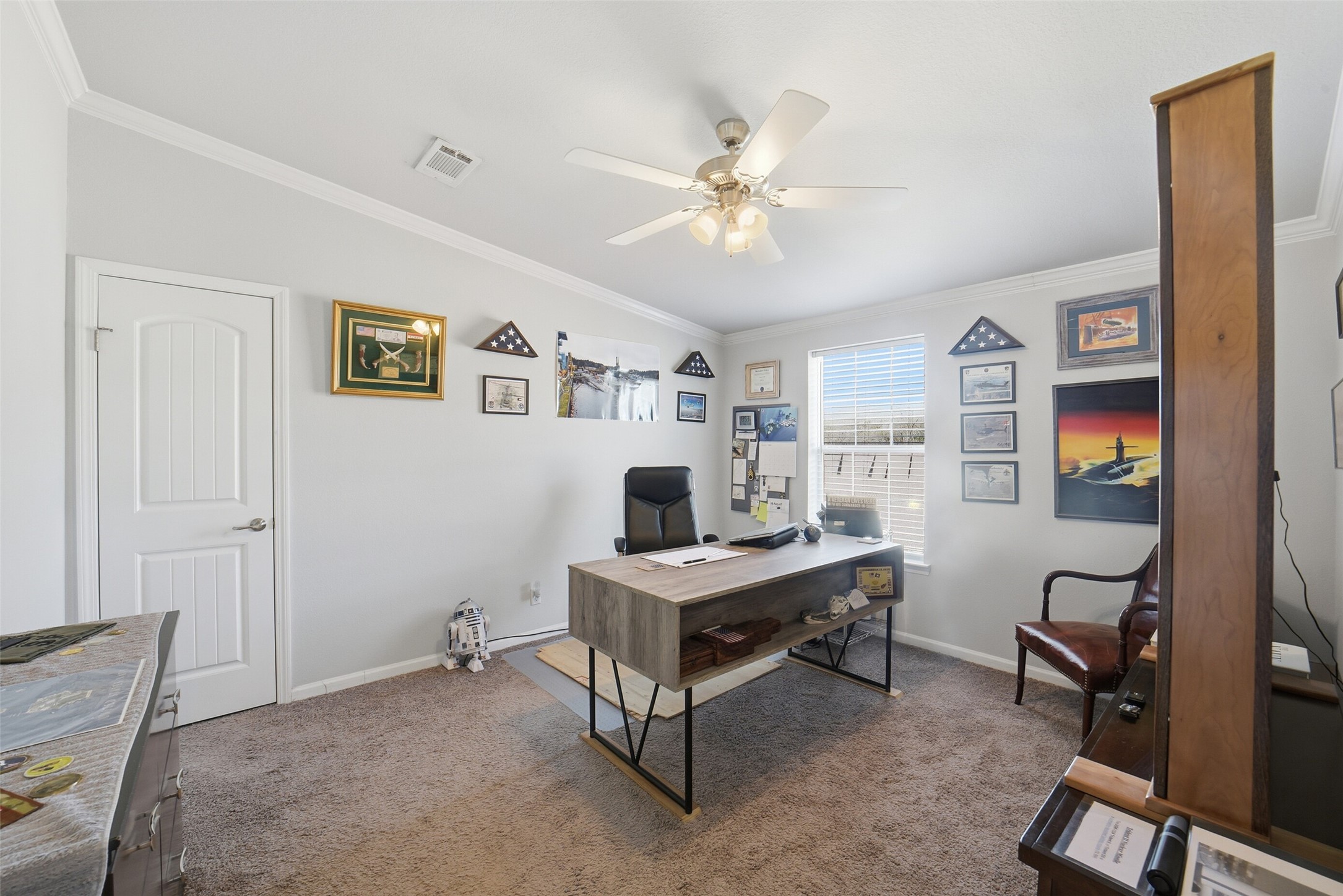 4007 Nancy Lane, Unit C546B Rosharon, TX 77583 - Photo 42 of 50 a view of a workspace with furniture and a window