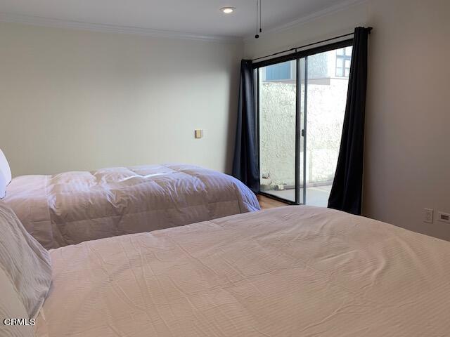 407 Shoreview Drive Port Hueneme, CA 93041 - Photo 29 of 39 a bedroom with a large bed and a large window