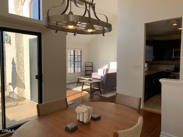 407 Shoreview Drive Port Hueneme, CA 93041 - Photo 7 of 39 a living room with a couch and a chandelier