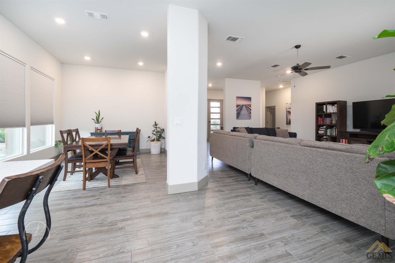 Undisclosed Address Shafter, CA 93263 - Photo 12 of 30 a view of a dining room with furniture and a chandelier