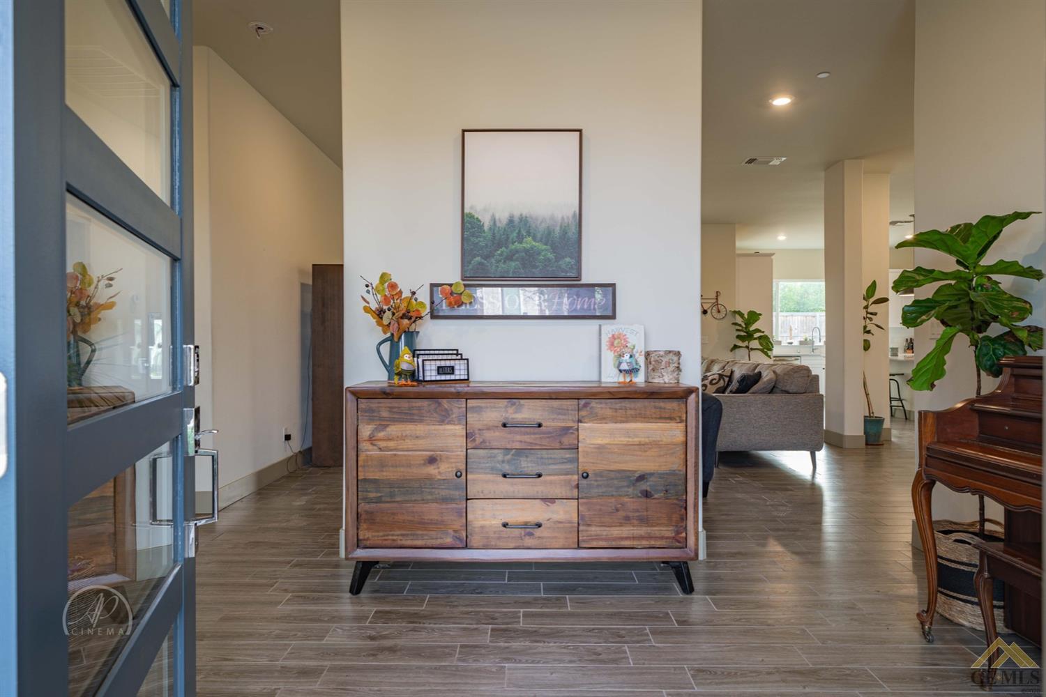 Undisclosed Address Shafter, CA 93263 - Photo 15 of 30 a view of living room with furniture and a potted plant