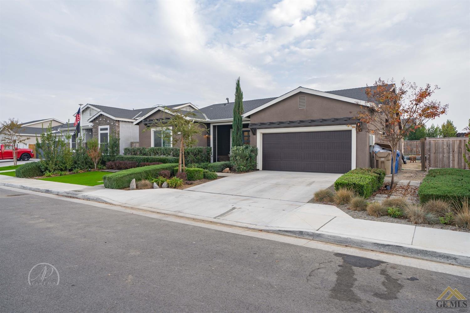 Undisclosed Address Shafter, CA 93263 - Photo 3 of 30 front view of house with a yard