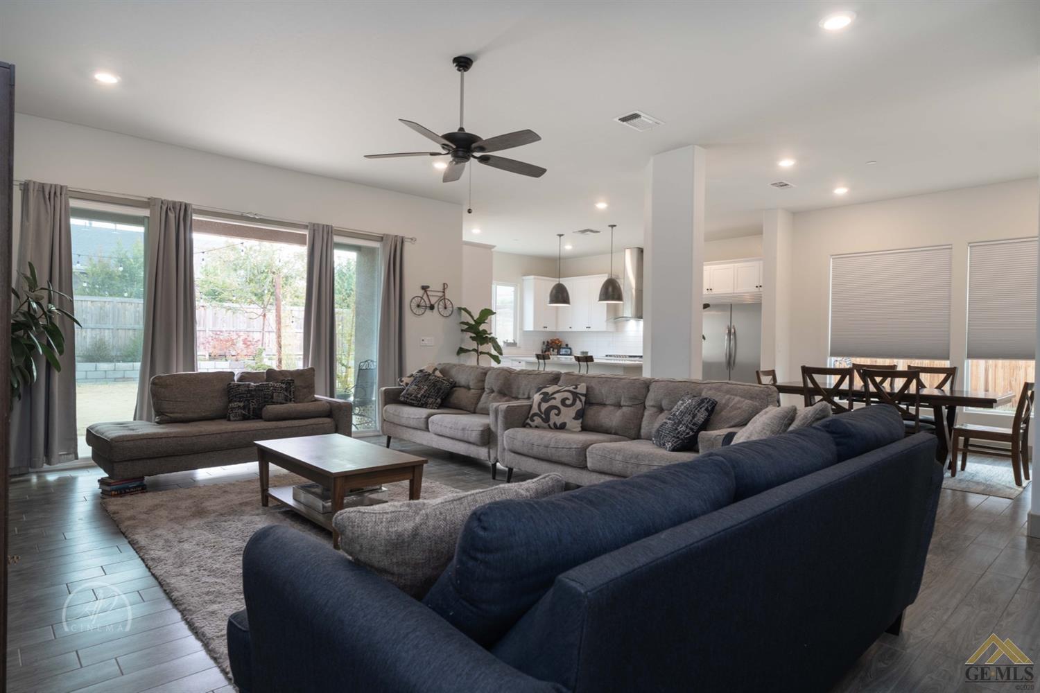 Undisclosed Address Shafter, CA 93263 - Photo 9 of 30 a living room with furniture kitchen view and a large window