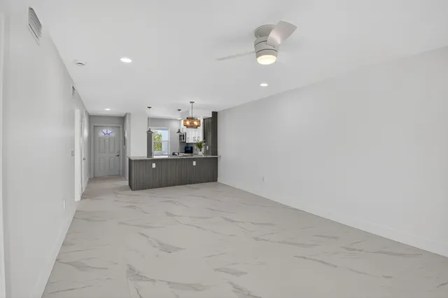 a view of kitchen and living room