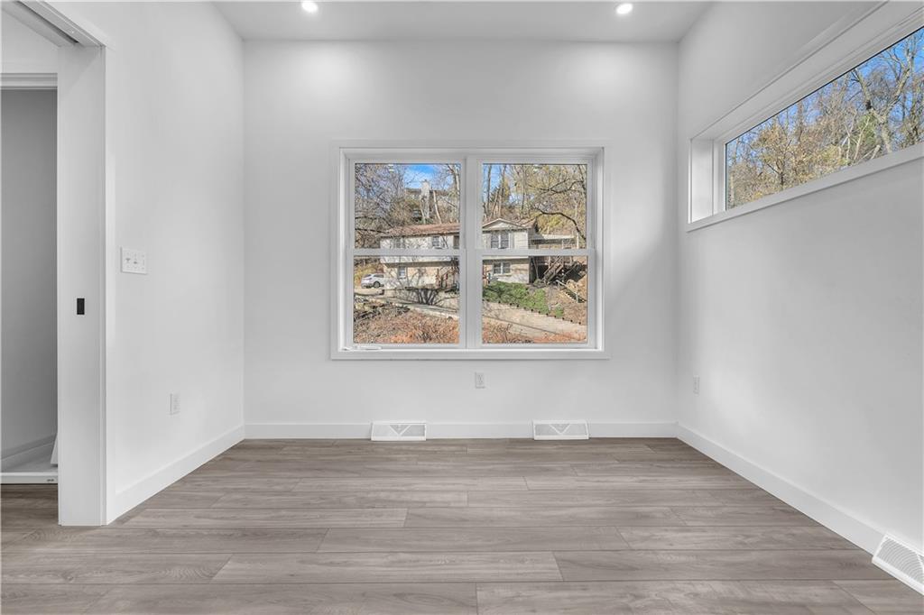 431 Shaler Street Pittsburgh, PA 15211 - Photo 20 of 33 wooden floor in an empty room
