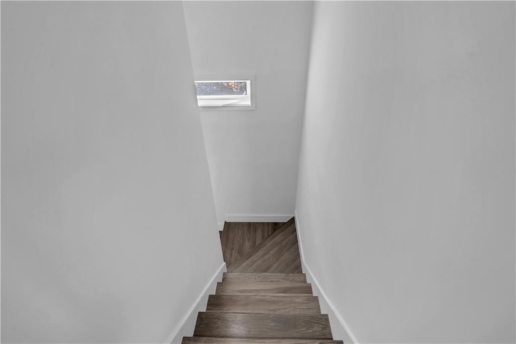 431 Shaler Street Pittsburgh, PA 15211 - Photo 24 of 33 a view of a hallway with stairs