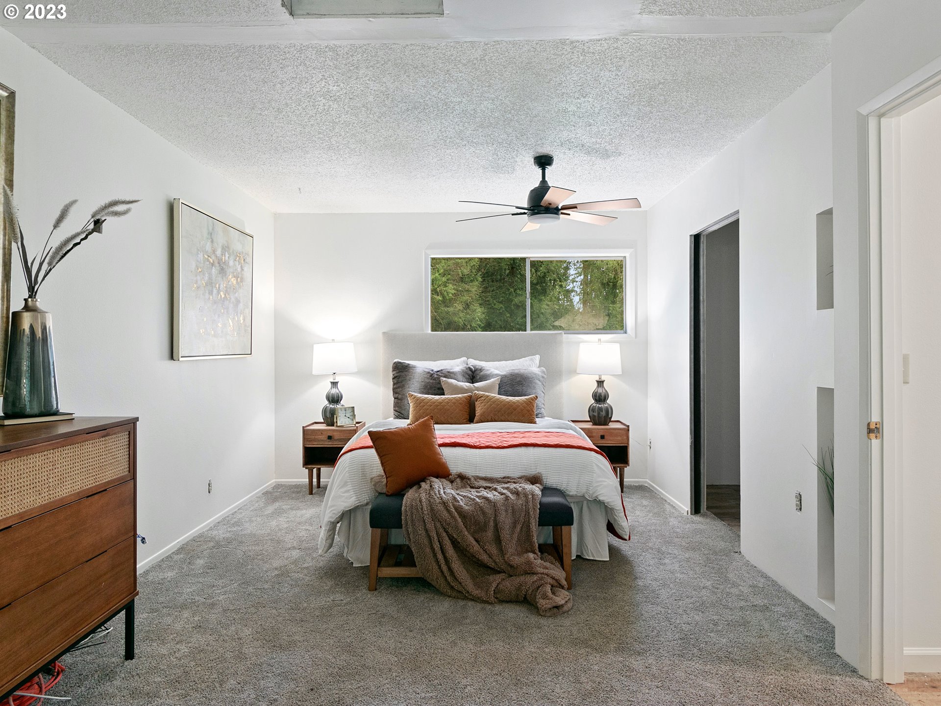 14113 South Graves Road Mulino, OR 97042 - Photo 13 of 33 a bedroom with bed and a chandelier