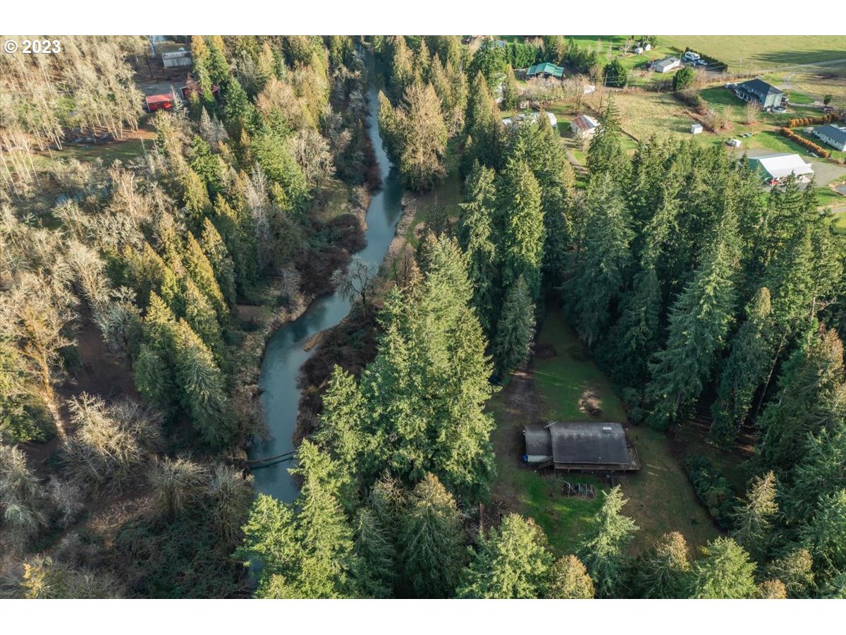 14113 South Graves Road Mulino, OR 97042 - Photo 23 of 33 a view of a house with a yard