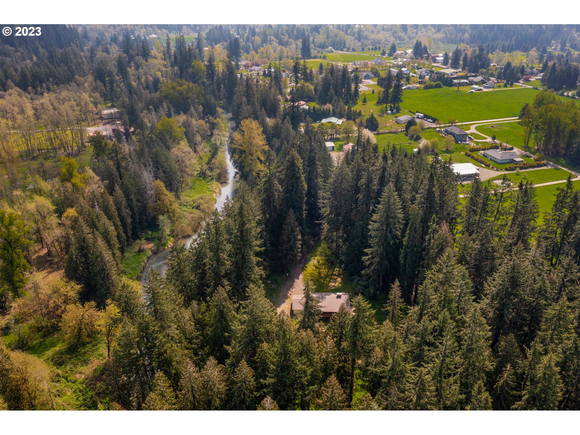 14113 South Graves Road Mulino, OR 97042 - Photo 3 of 33 a view of a lake with houses