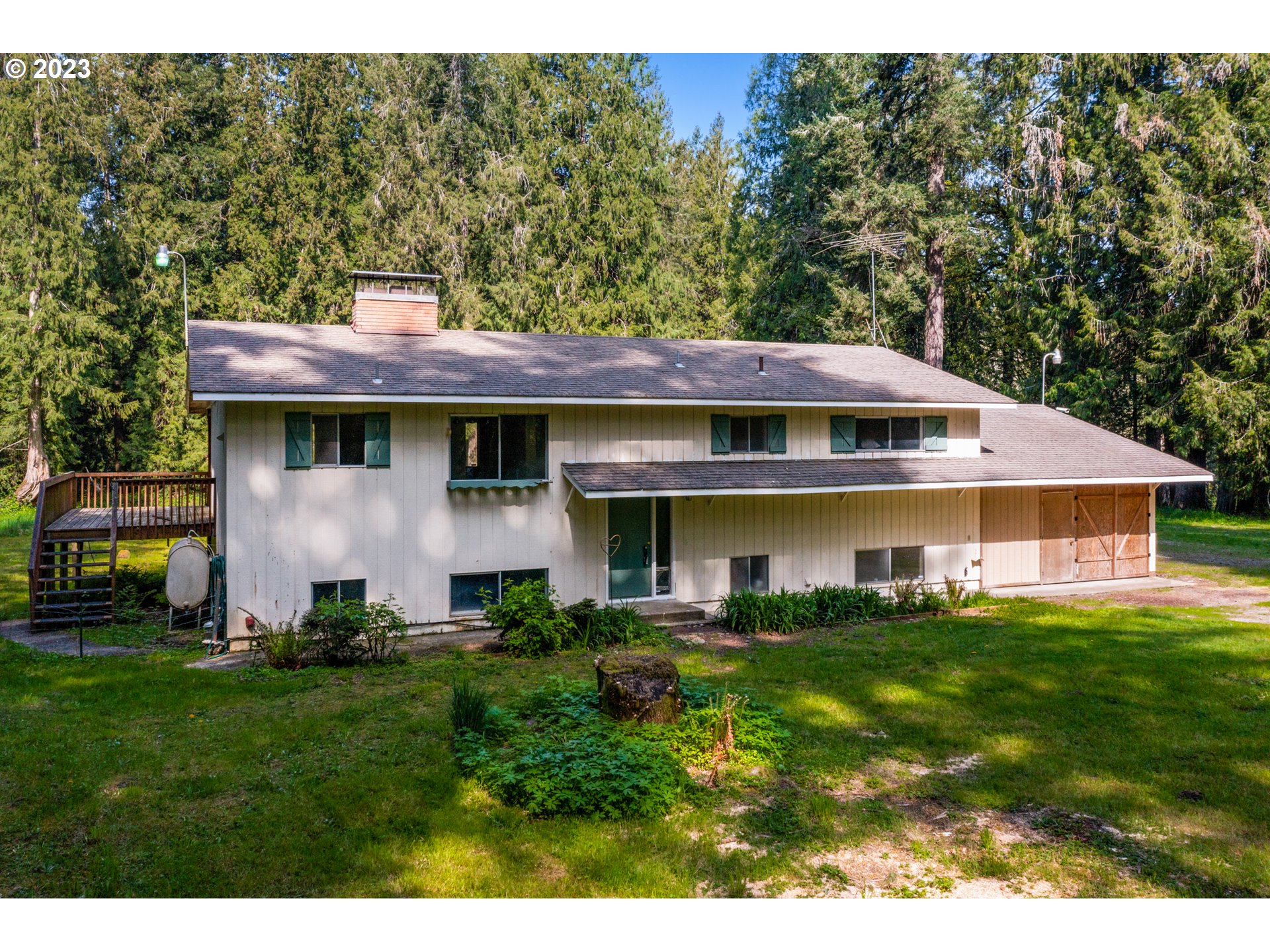 14113 South Graves Road Mulino, OR 97042 - Photo 32 of 33 a view of a house with a yard porch and sitting area