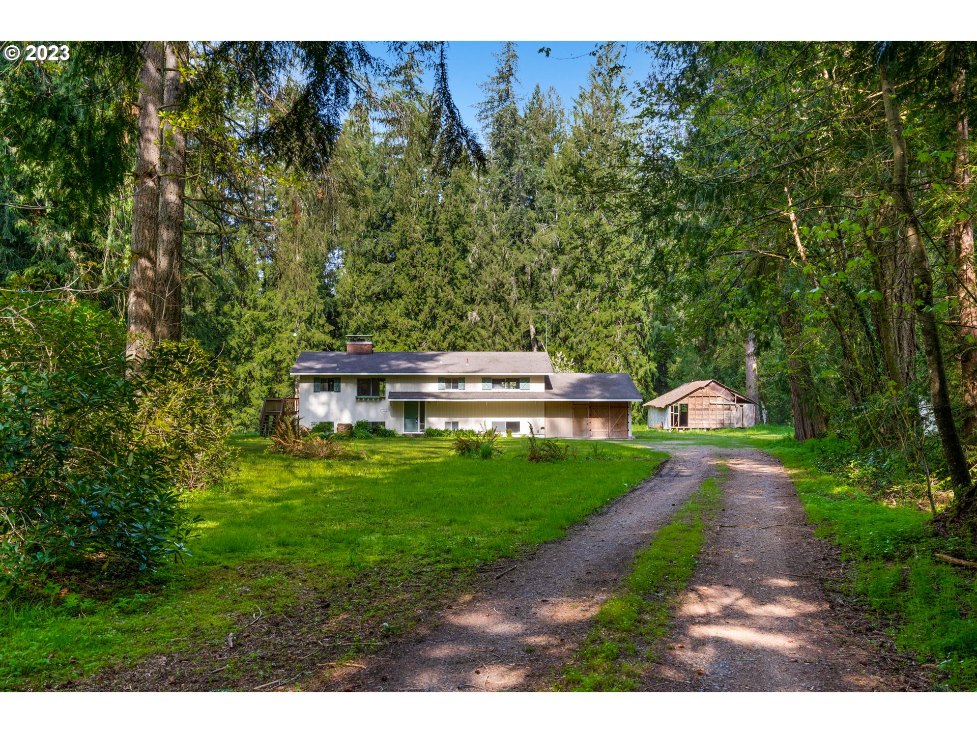 14113 South Graves Road Mulino, OR 97042 - Photo 6 of 33 a view of a yard with plants
