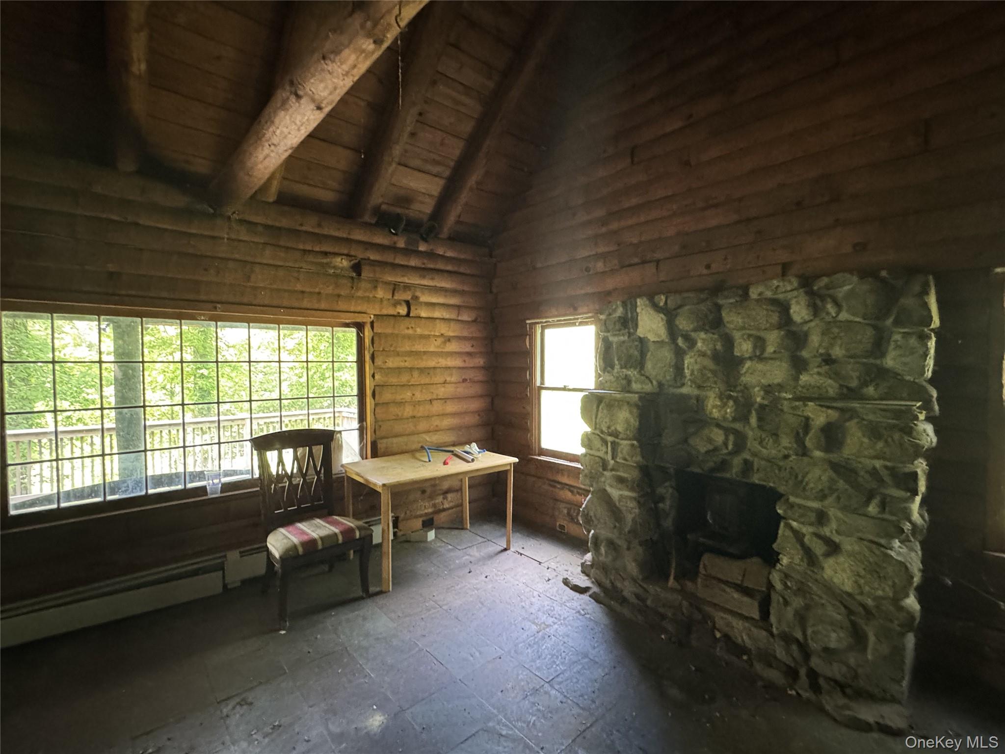 68 Union School Road Montgomery, NY 12549 - Photo 15 of 37 Home office featuring baseboard heating, wood ceiling with exposed beams, plenty of natural light, and high vaulted ceiling