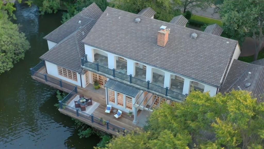 3616 Lovers Lane University Park, TX 75225 - Photo 1 of 1 an aerial view of a house with balcony and trees al around