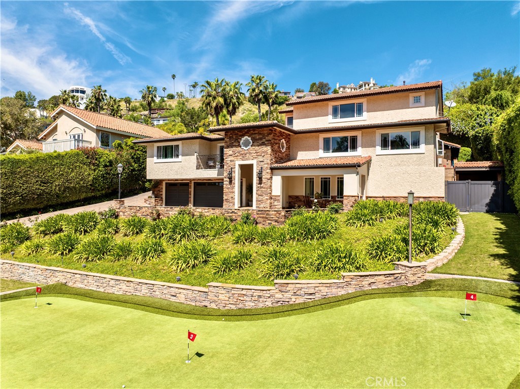 19151 Fowler Avenue Santa Ana, CA 92705 - Photo 14 of 57 Over the putting green to the house.