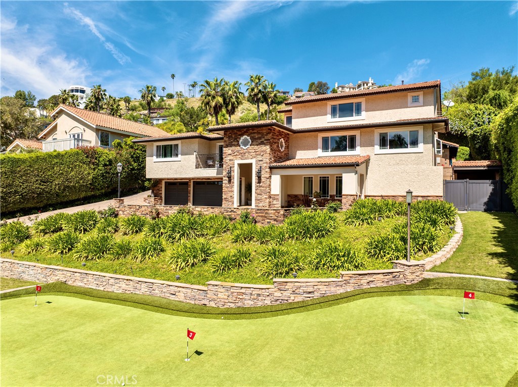 19151 Fowler Avenue Santa Ana, CA 92705 - Photo 14 of 57 Over the putting green to the house.
