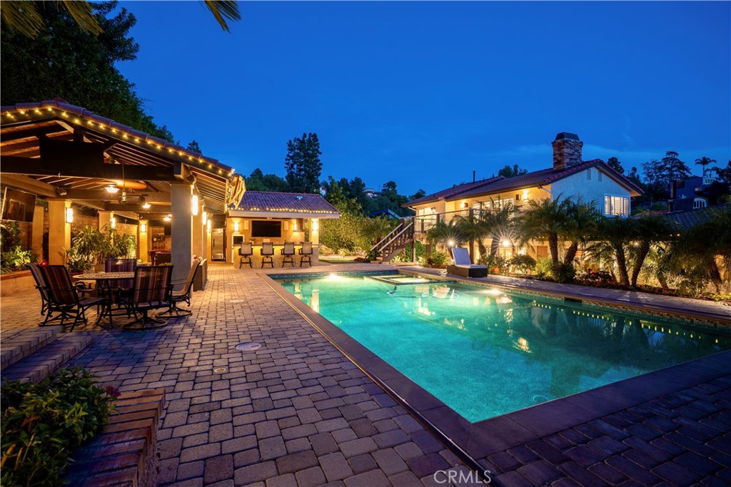 19151 Fowler Avenue Santa Ana, CA 92705 - Photo 3 of 57 The backyard oasis at dusk.